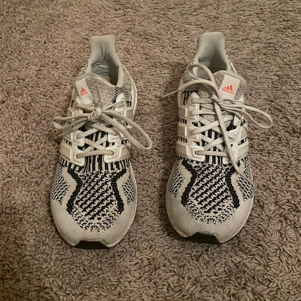 Ultra boost adidas shoes, in a size womens 8 which is a mens 6.5